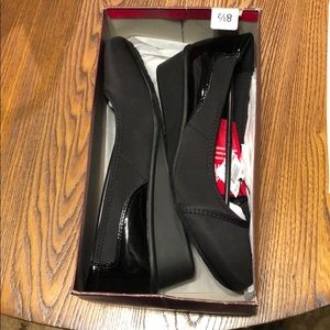Black dress shoe.